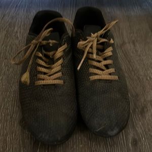 Speed viper soccer cleats. Gold and dark gray. (Worn)